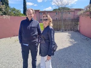 Alberti Antonini with his wife Alessandra outside their residence