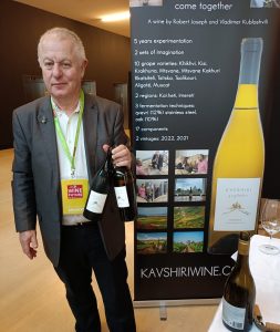 Robert Joseph at Wine Future 2023 with bottles of K'AVSHIRI